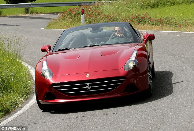 Experts claim the Carrie (top) has the distinctive frontage and headlights of a Ferrari California (bottom)